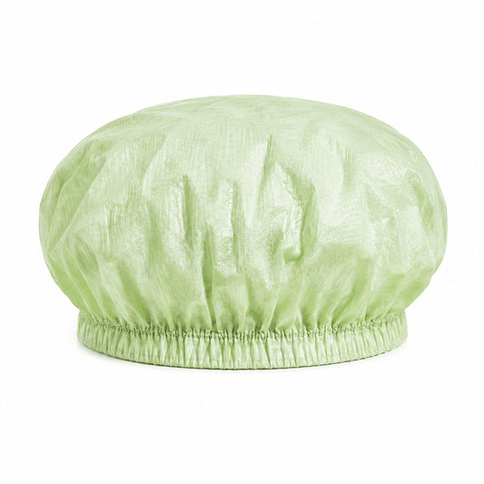 22-inch 65 gsm light green PLA/PBAT microporous bouffant cap on white background