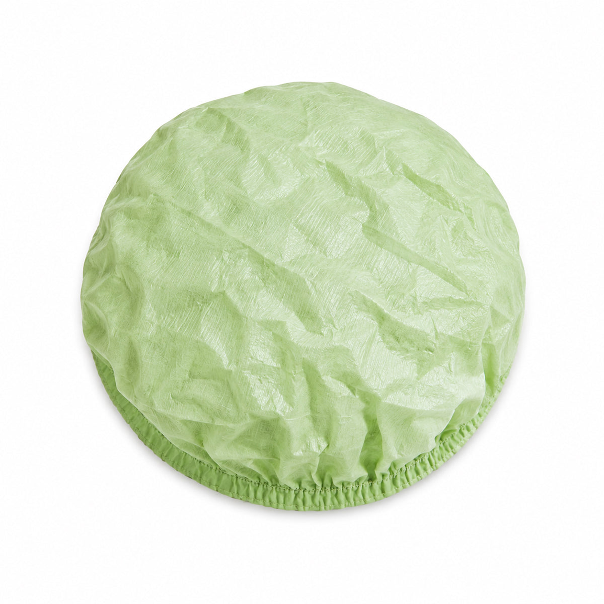 Light green 22-inch PLA/PBAT bouffant hair cap product close-up