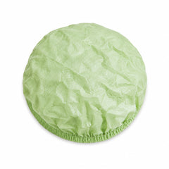 Light green 22-inch PLA/PBAT bouffant hair cap product close-up