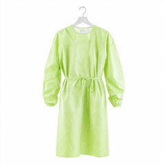 Green isolation gown hanging front view on white background
