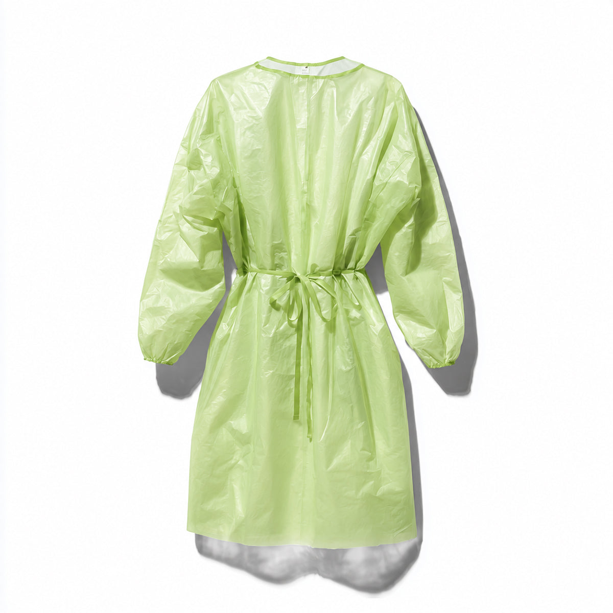 Green disposable isolation gown product display on white