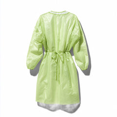 Green disposable isolation gown product display on white