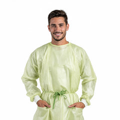 Front view of person wearing green isolation gown with waist ties