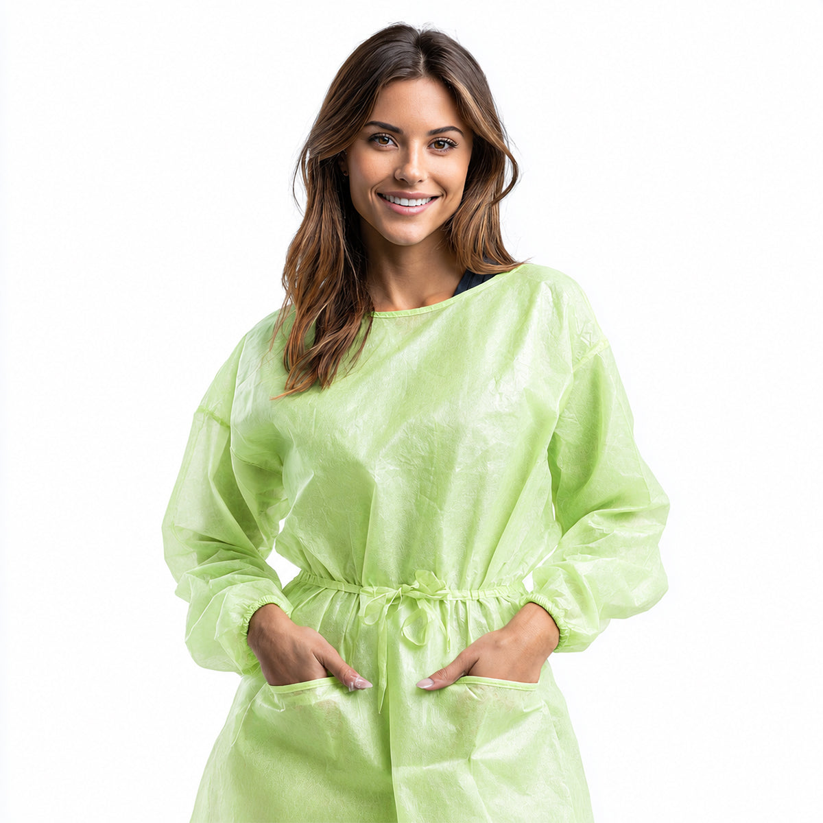 Green disposable gown shown on wearer against white background