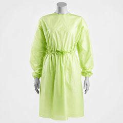 Green disposable gown front view on mannequin