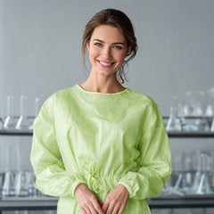 Full-length green disposable gown on mannequin