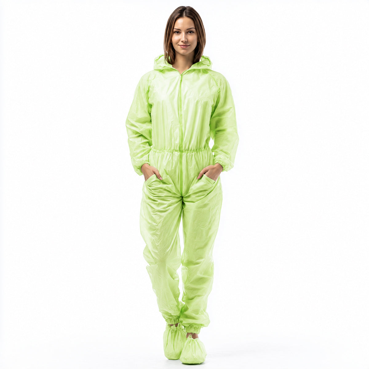 Person wearing green hooded disposable coverall on white