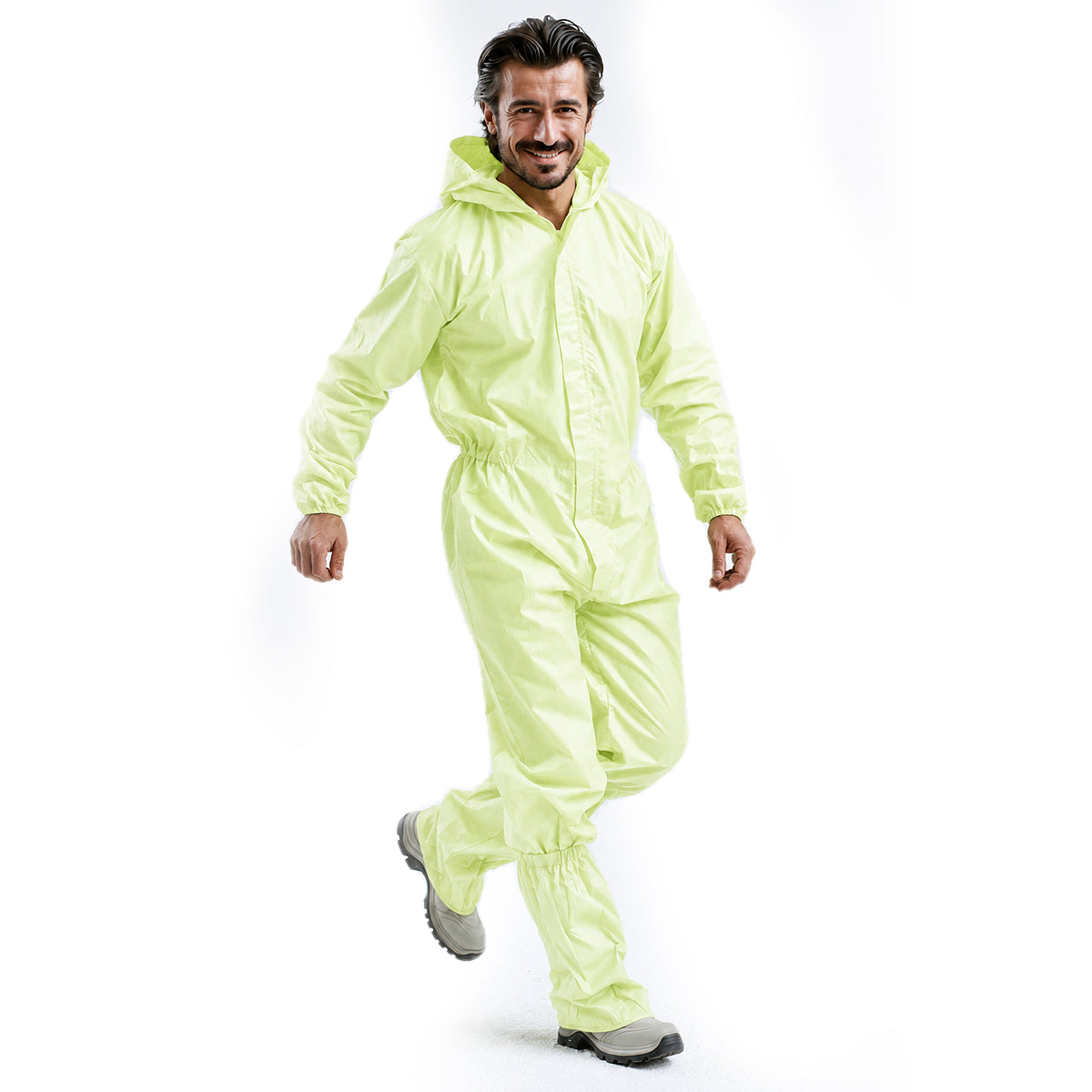 Person walking in green PLA/PBAT protective coverall