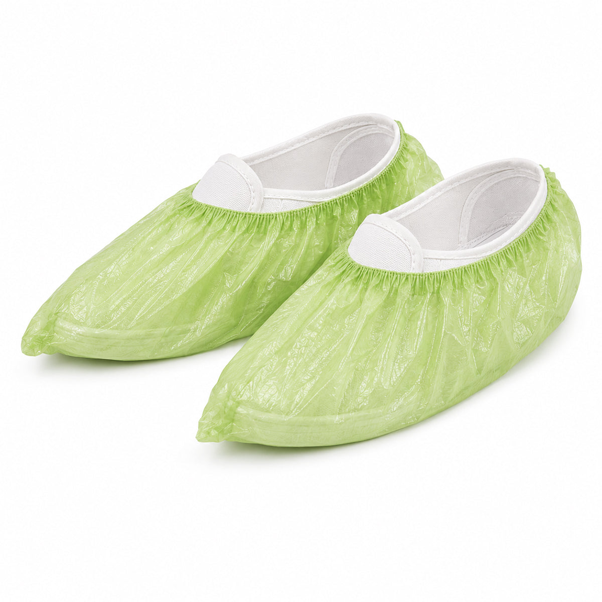 Two green PLA/PBAT shoe covers photographed on white